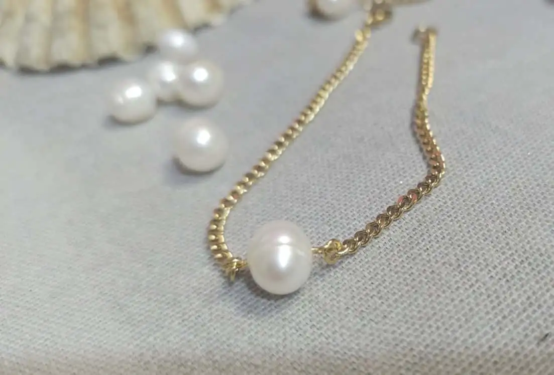 Χρυσό βραχιόλι με πέρλα